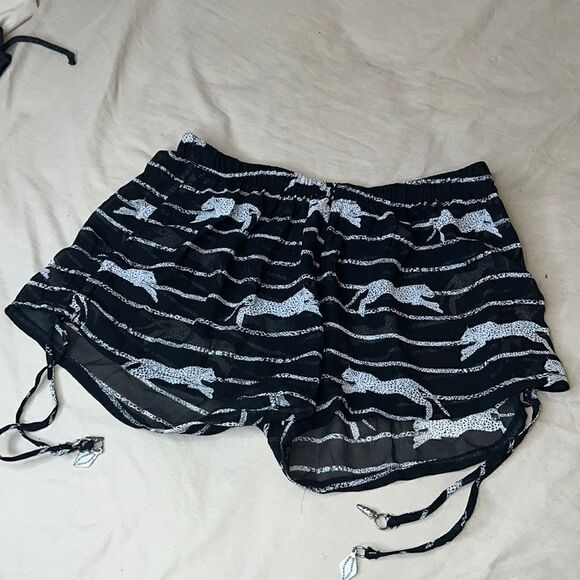 Sheer swim shorts with cheetahs black size XS - Picture 1 of 4